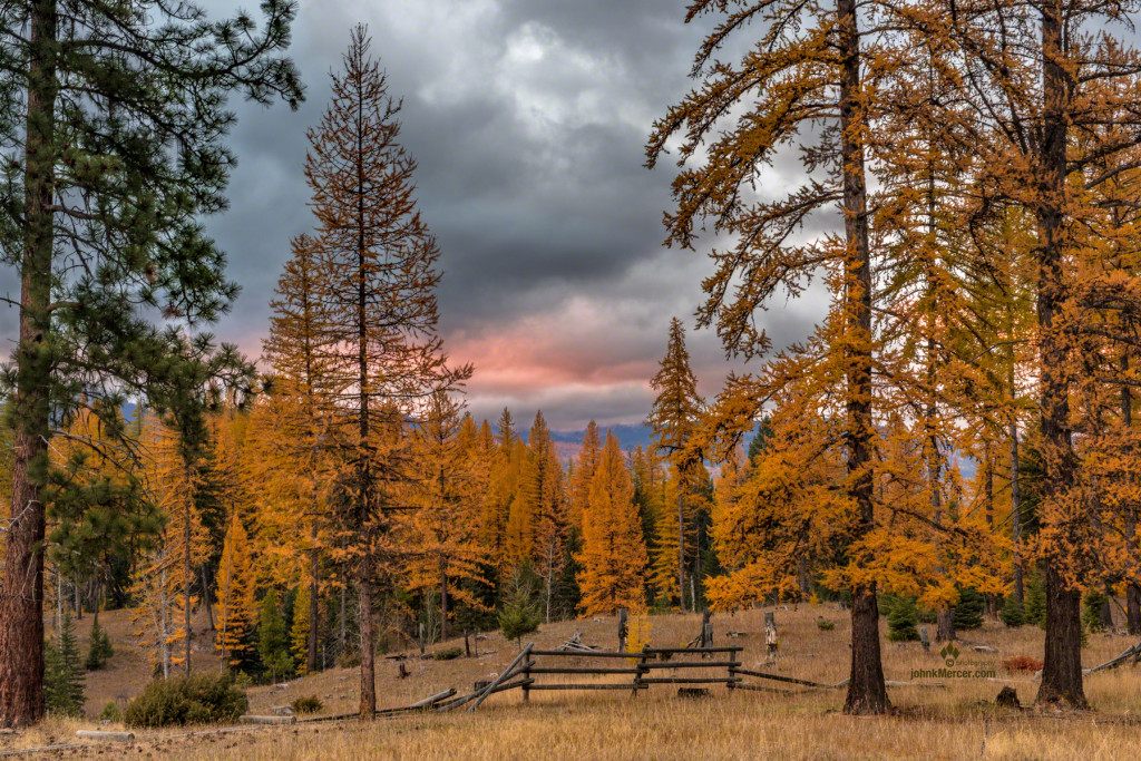 The clouds clear ennough to let the sunset color them over Mollman Pass in the Mission Mountain Range.